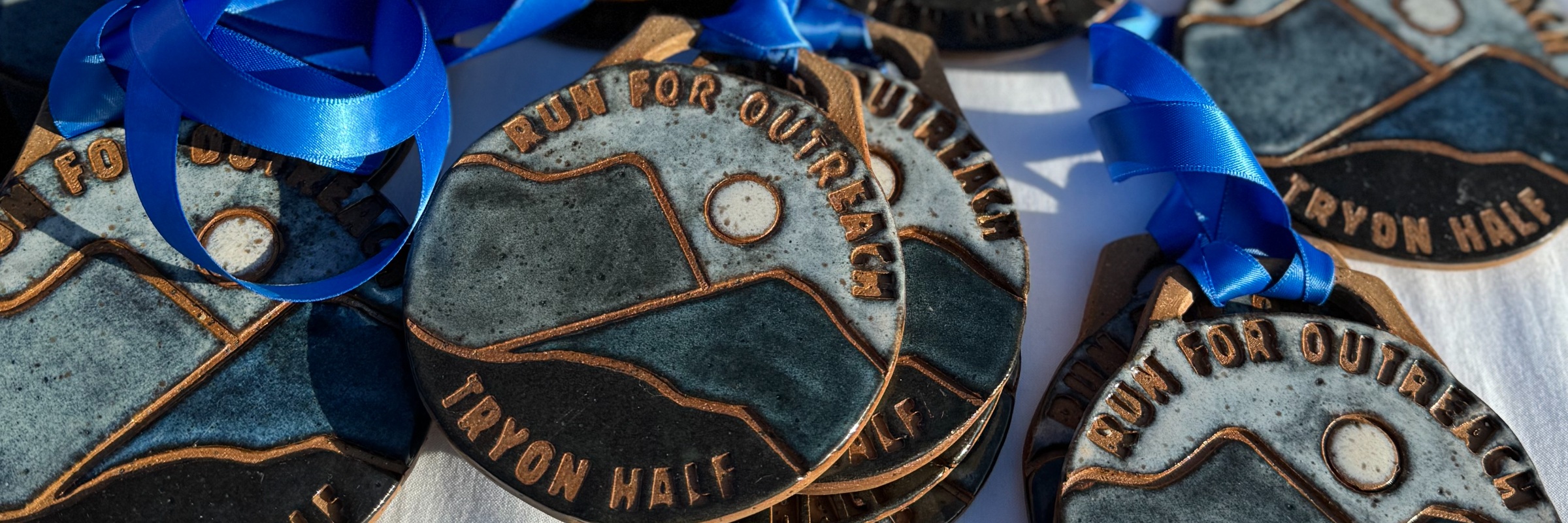 Run for Outreach - Tryon Half Marathon and Fall for the Foothills 5K